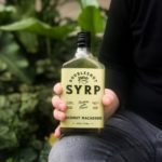 doubleshot_man_holding_coconut_macaroon_coffee_syrup